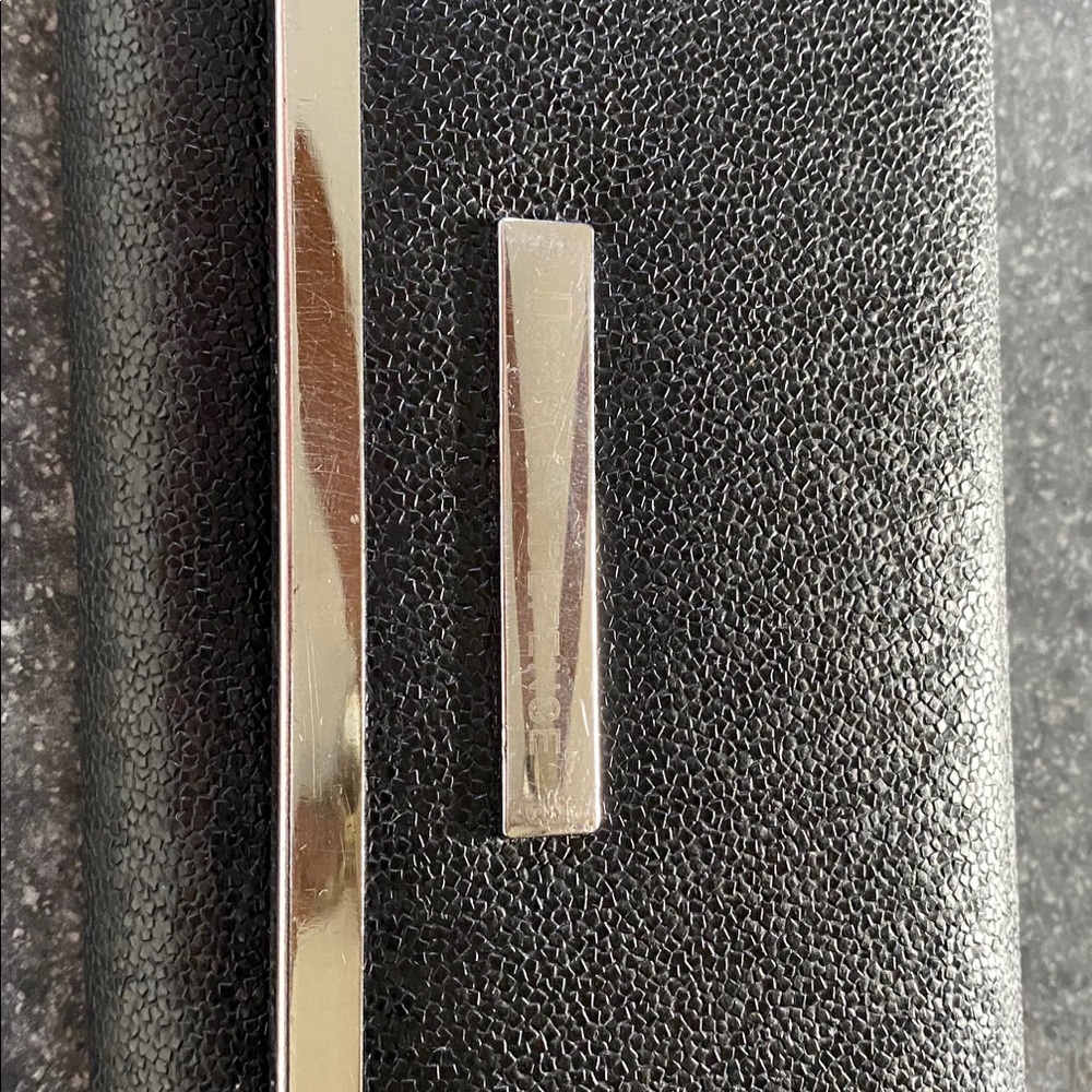 Damsel In Defense Wallet. Black trimmed in silver.